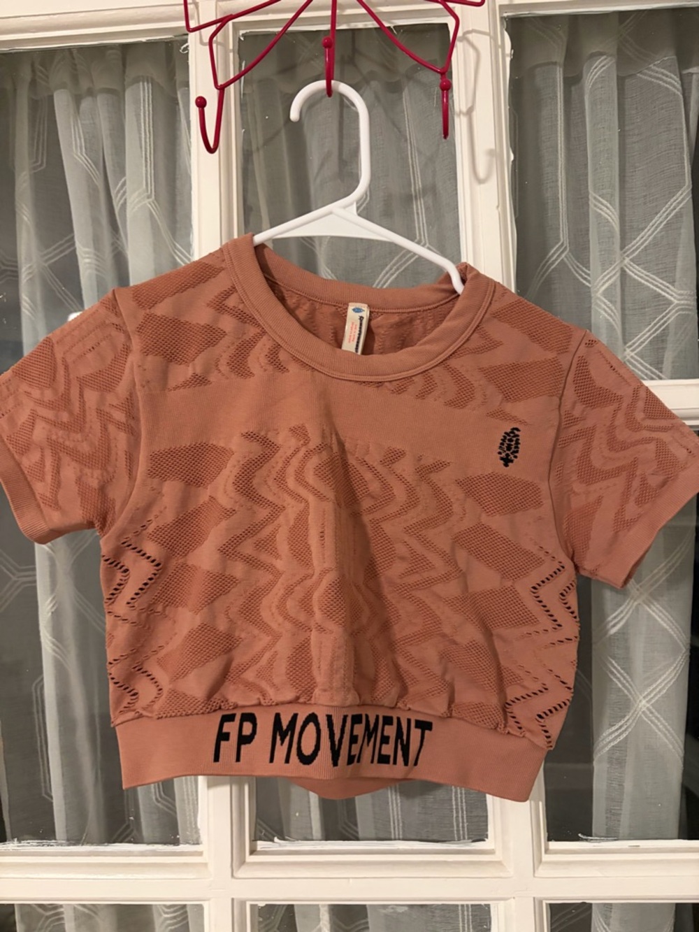 Free people movement Short Sleeve Cropped Tee - Dusty Rose. Size is m/L